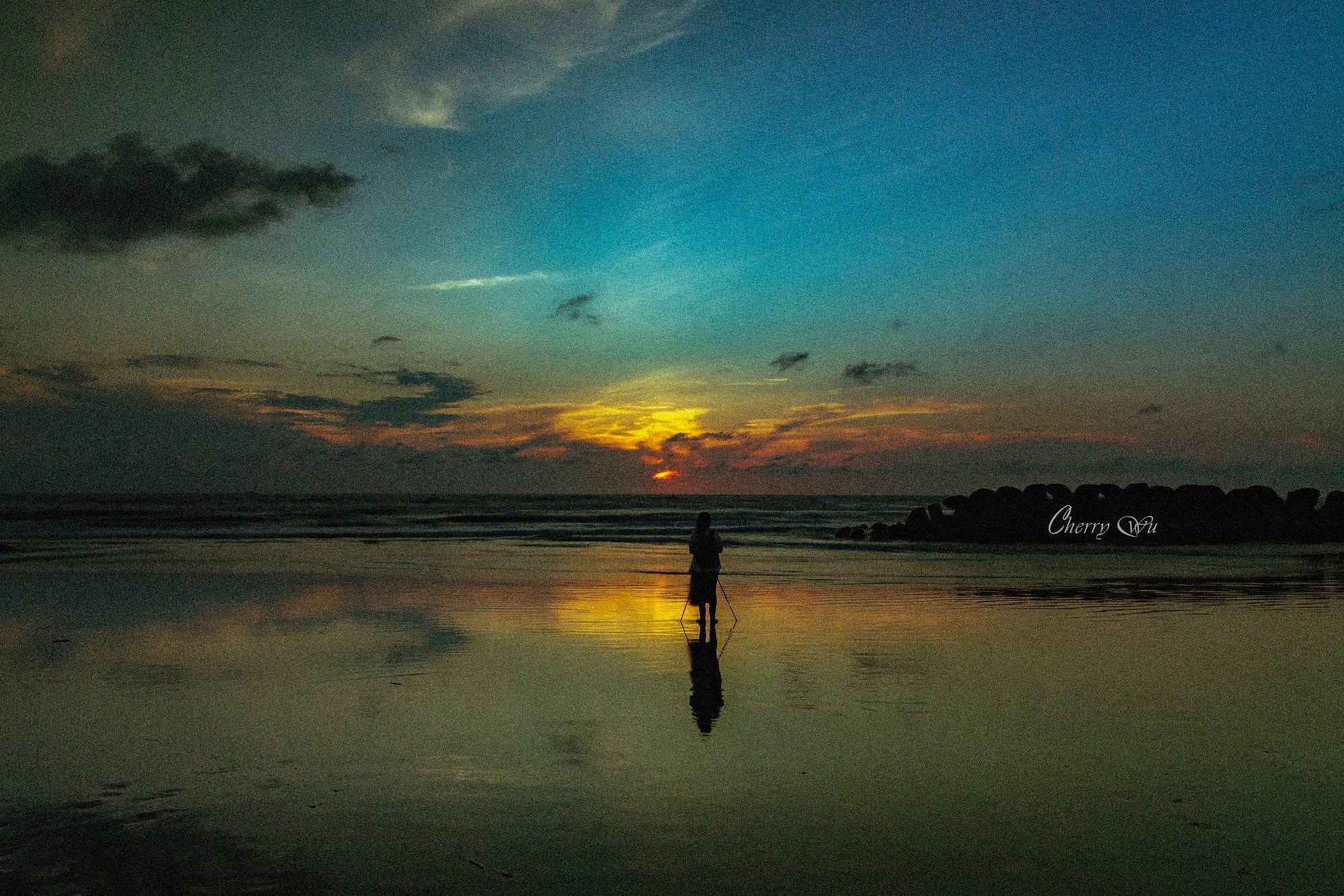 海邊夕陽剪影